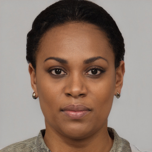 Neutral black young-adult female with short  black hair and brown eyes