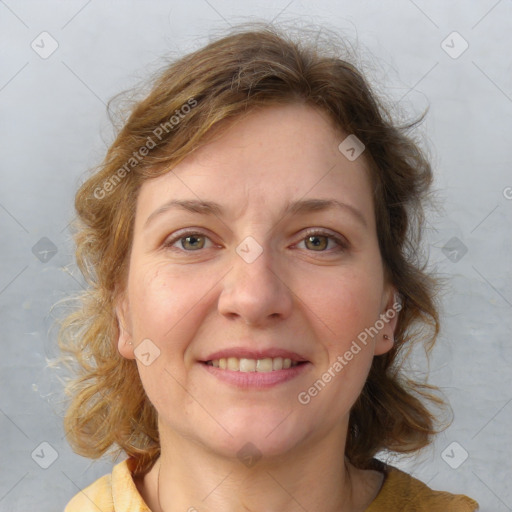 Joyful white young-adult female with medium  brown hair and blue eyes