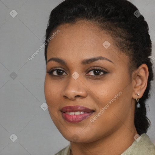 Joyful black young-adult female with long  brown hair and brown eyes