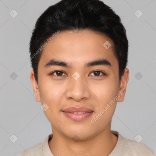 Joyful asian young-adult male with short  black hair and brown eyes