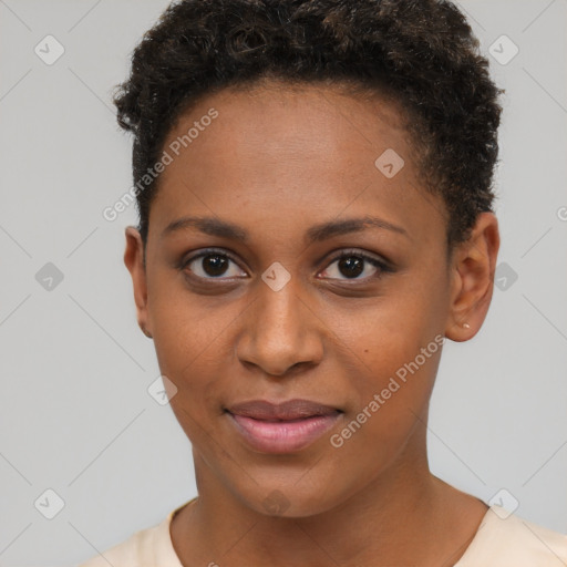 Joyful black young-adult female with short  brown hair and brown eyes