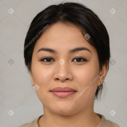 Joyful asian young-adult female with medium  brown hair and brown eyes