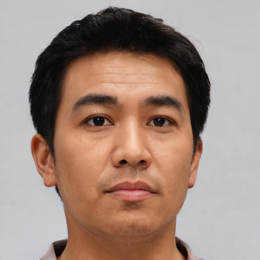 Neutral asian young-adult male with short  black hair and brown eyes