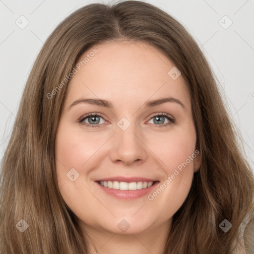 Joyful white young-adult female with long  brown hair and green eyes