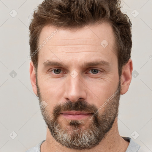 Neutral white adult male with short  brown hair and brown eyes