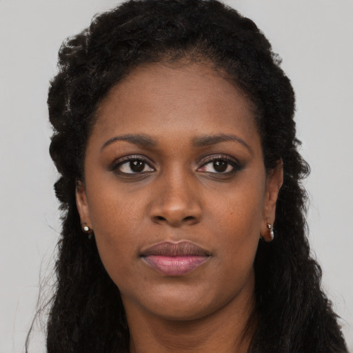 Neutral black young-adult female with long  black hair and brown eyes