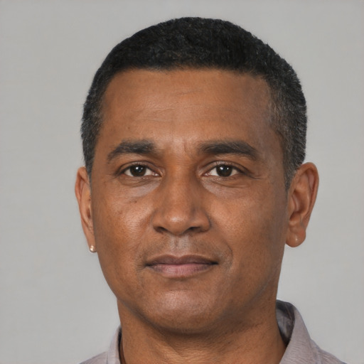 Neutral latino adult male with short  black hair and brown eyes