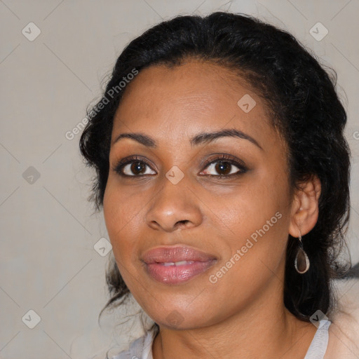 Joyful black young-adult female with medium  black hair and brown eyes