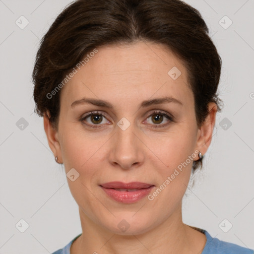 Joyful white adult female with short  brown hair and brown eyes