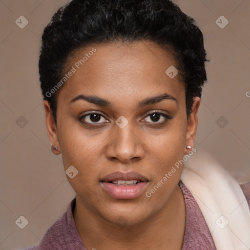 Joyful black young-adult female with short  black hair and brown eyes