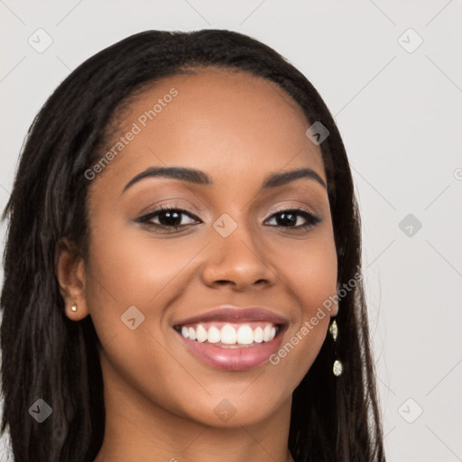 Joyful latino young-adult female with long  brown hair and brown eyes