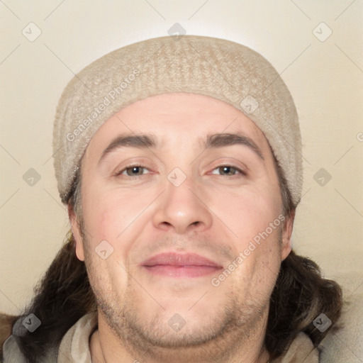 Joyful white adult male with short  brown hair and brown eyes