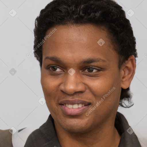 Joyful black adult female with short  brown hair and brown eyes