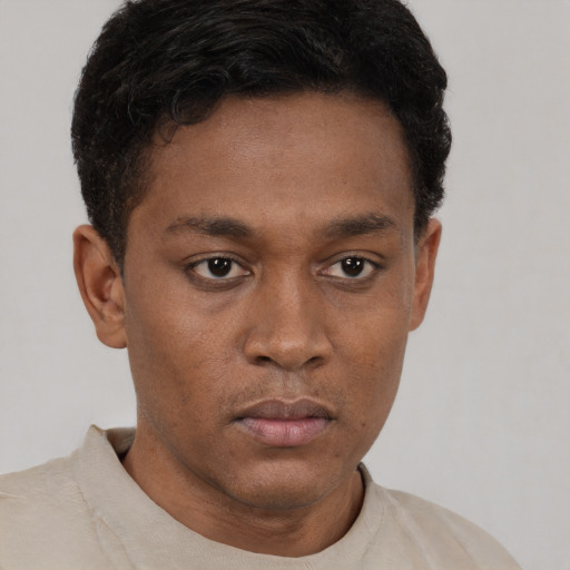 Neutral black young-adult male with short  brown hair and brown eyes