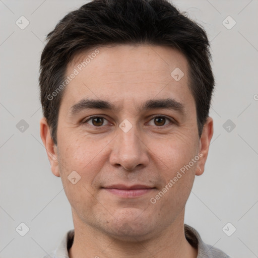 Joyful white adult male with short  brown hair and brown eyes