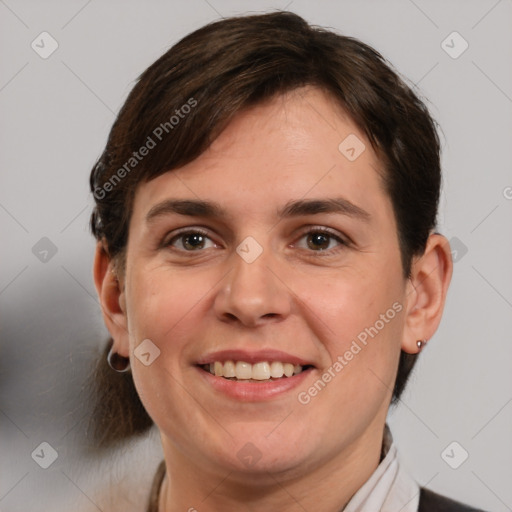 Joyful white adult female with medium  brown hair and brown eyes