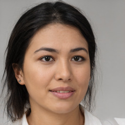 Joyful asian young-adult female with medium  brown hair and brown eyes