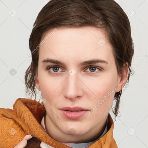 Neutral white young-adult female with short  brown hair and brown eyes