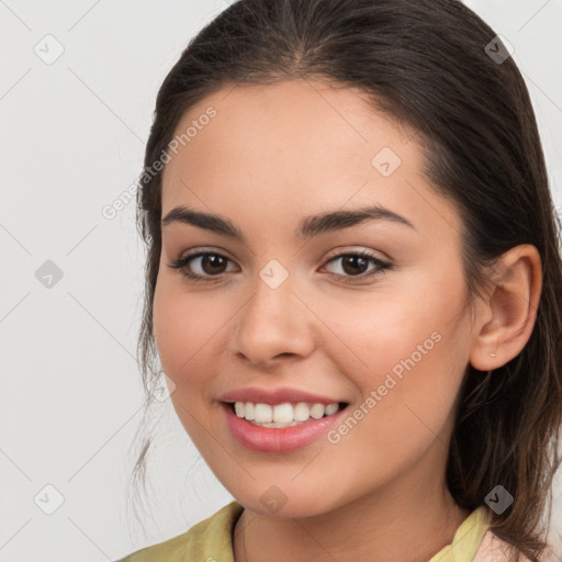 Joyful white young-adult female with medium  brown hair and brown eyes