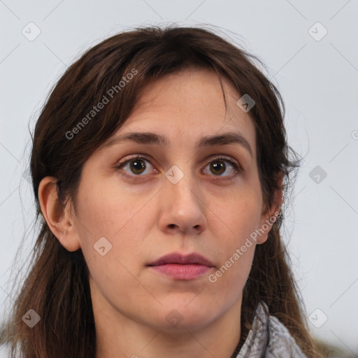 Neutral white young-adult female with long  brown hair and brown eyes