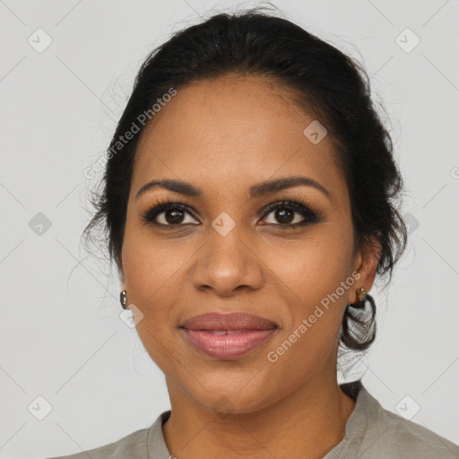 Joyful black young-adult female with medium  brown hair and brown eyes