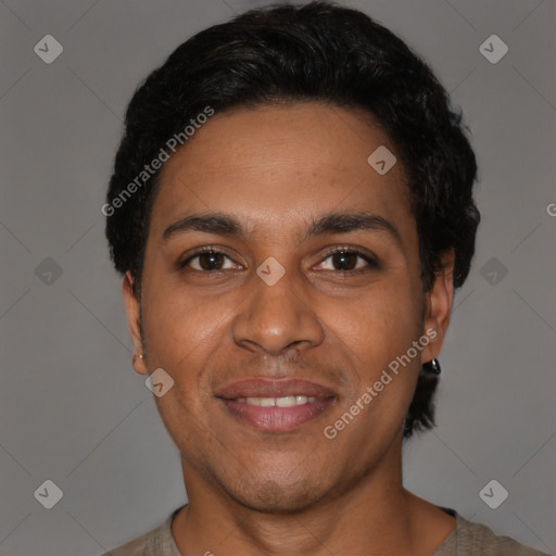 Joyful black young-adult male with short  black hair and brown eyes