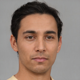 Neutral asian young-adult male with short  brown hair and brown eyes