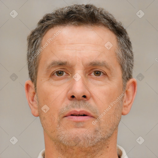 Neutral white adult male with short  brown hair and brown eyes