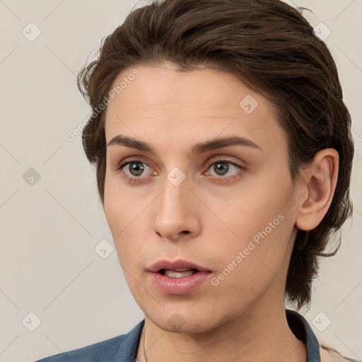 Neutral white young-adult female with medium  brown hair and brown eyes