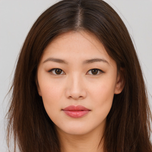 Neutral asian young-adult female with long  brown hair and brown eyes