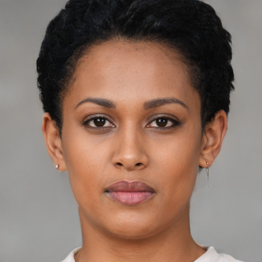 Neutral latino young-adult female with short  black hair and brown eyes