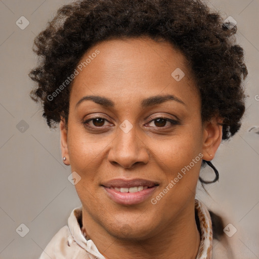 Joyful black adult female with short  brown hair and brown eyes