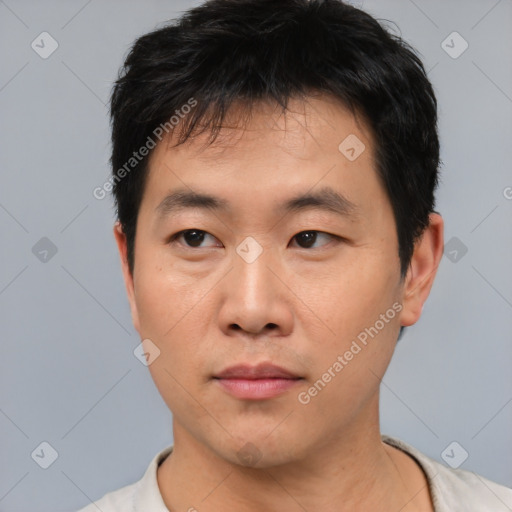 Neutral asian young-adult male with short  black hair and brown eyes