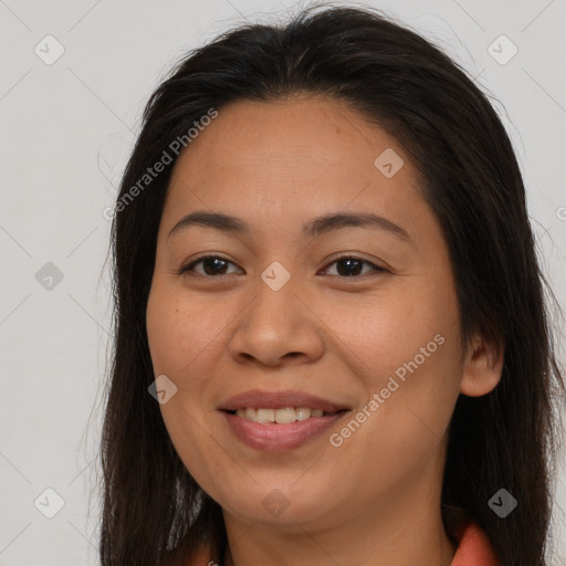 Joyful asian young-adult female with long  brown hair and brown eyes