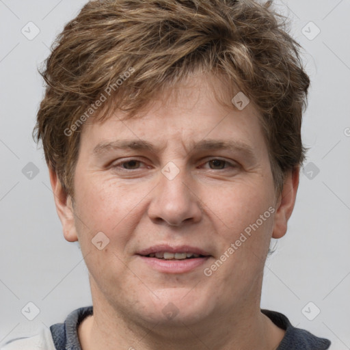 Joyful white adult male with short  brown hair and grey eyes