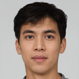 Neutral asian young-adult male with short  black hair and brown eyes