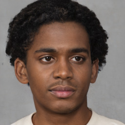 Neutral black young-adult male with short  brown hair and brown eyes