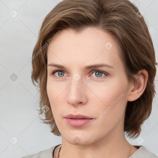 Neutral white young-adult female with medium  brown hair and grey eyes