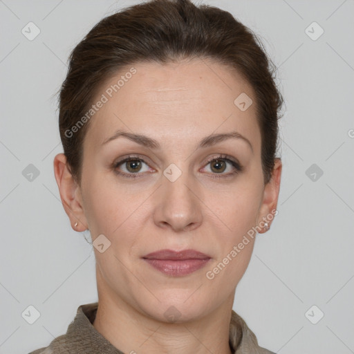 Joyful white adult female with short  brown hair and grey eyes