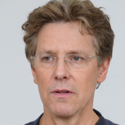 Neutral white middle-aged male with short  brown hair and brown eyes