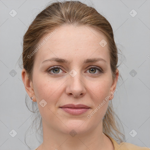 Joyful white young-adult female with medium  brown hair and grey eyes