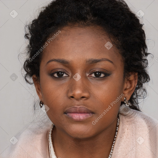 Neutral black young-adult female with long  brown hair and brown eyes