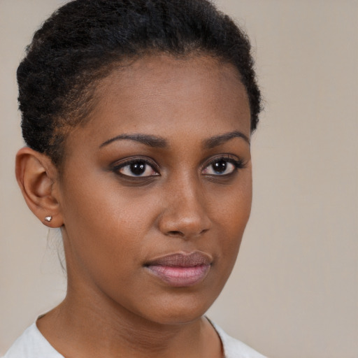 Neutral black young-adult female with short  brown hair and brown eyes