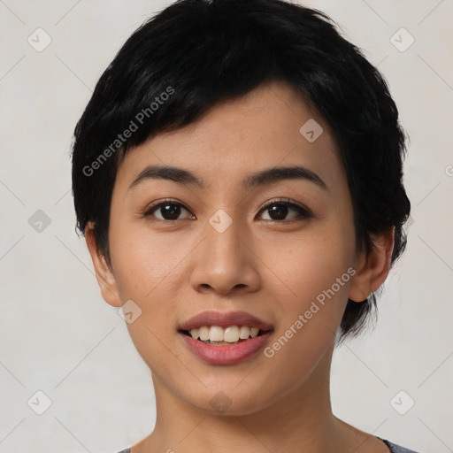 Joyful asian young-adult female with short  black hair and brown eyes