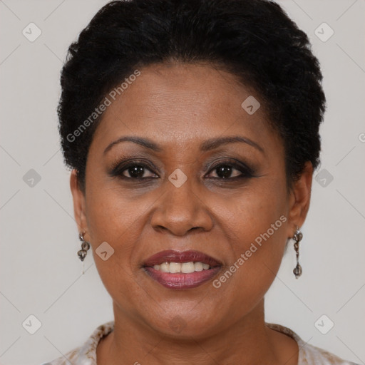 Joyful black adult female with short  brown hair and brown eyes