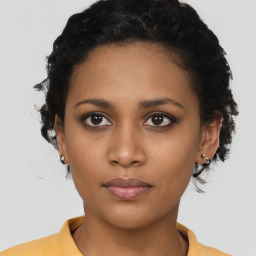 Neutral black young-adult female with short  black hair and brown eyes