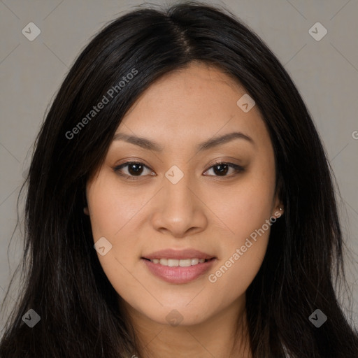 Joyful latino young-adult female with long  brown hair and brown eyes