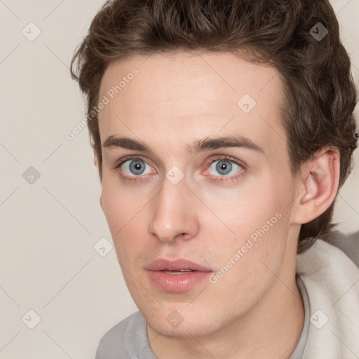 Neutral white young-adult male with short  brown hair and grey eyes