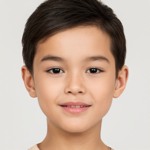 Joyful white child male with short  brown hair and brown eyes