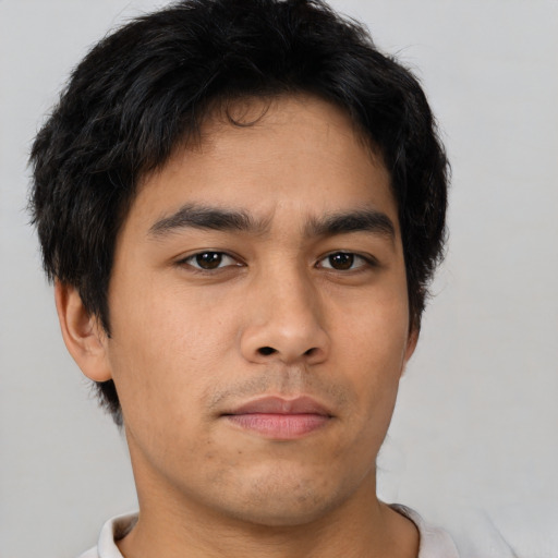 Neutral asian young-adult male with short  brown hair and brown eyes
